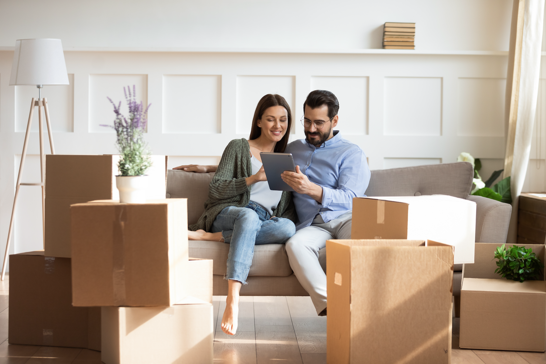 couple moving into apartment contemplating renters insurance